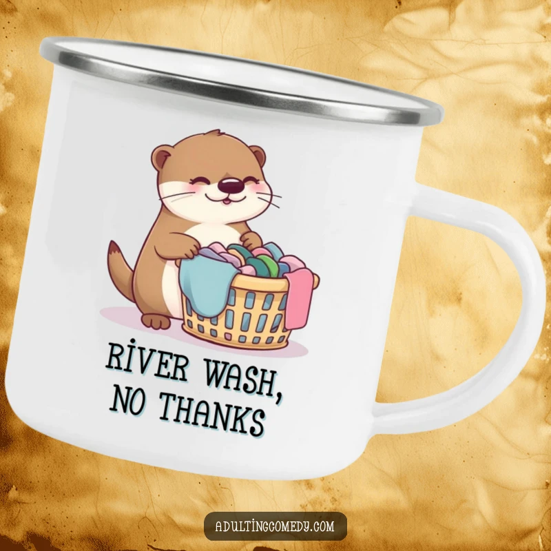 Funny otter camping mug with a bewildered otter and laundry basket, perfect for outdoor relaxation.