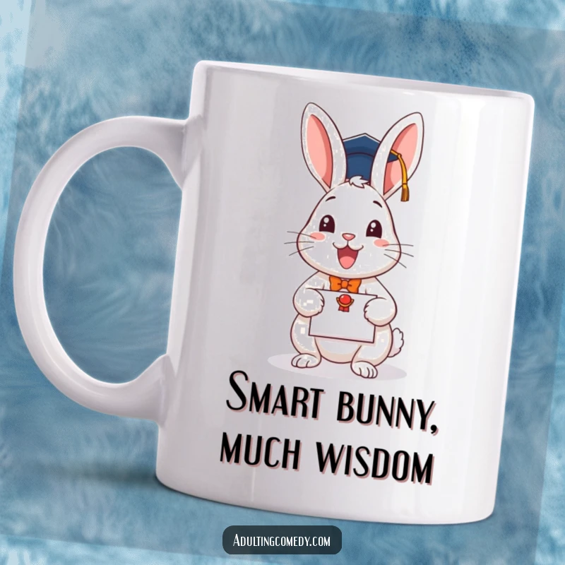 Funny graduation mug featuring a cheerful rabbit in a cap, proudly holding a diploma, perfect for gift-giving.