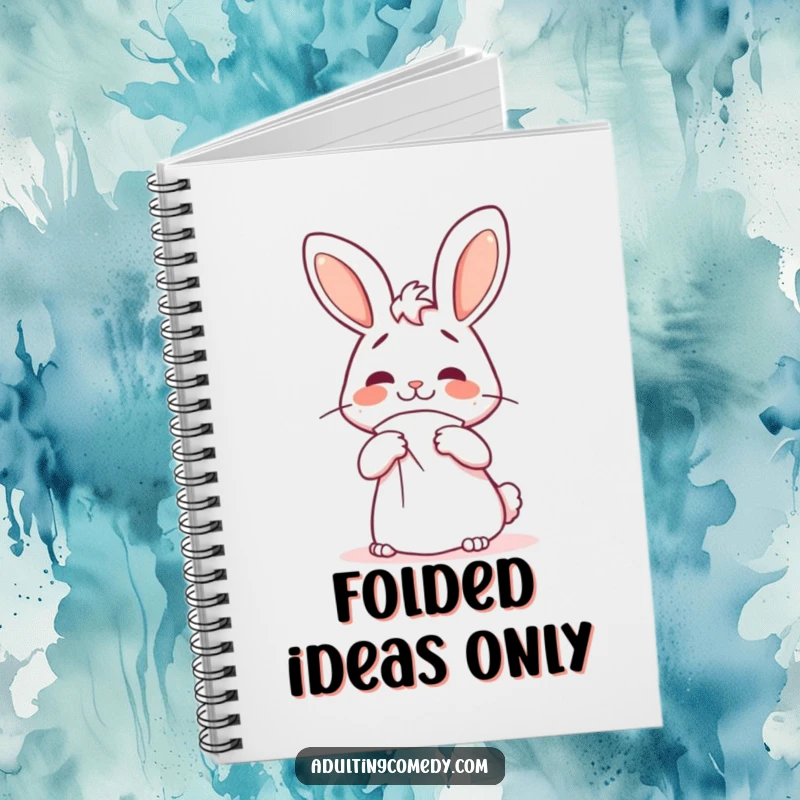 Funny bunny notebook showing a cheerful rabbit with a confused expression struggling with a giant napkin, ideal for notes.