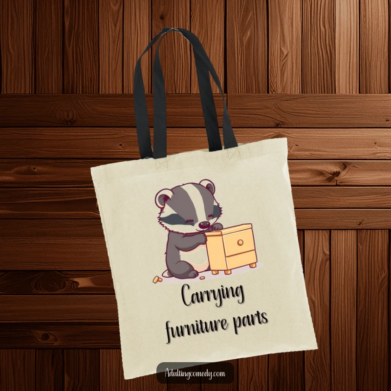 Funny badger tote bag depicting a busy creature carefully assembling a small, wobbly piece of furniture, perfect for a funny gift.